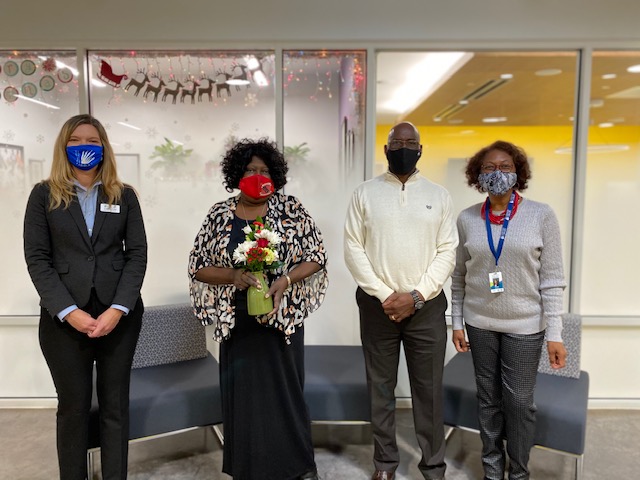 Melvin Graham (middle right), brother of the late Cynthia Graham Hurd, presented his sister's namesake award to CCPL staff member Sheila Heyward (middle left) during a virtual ceremony on Dec. 16.