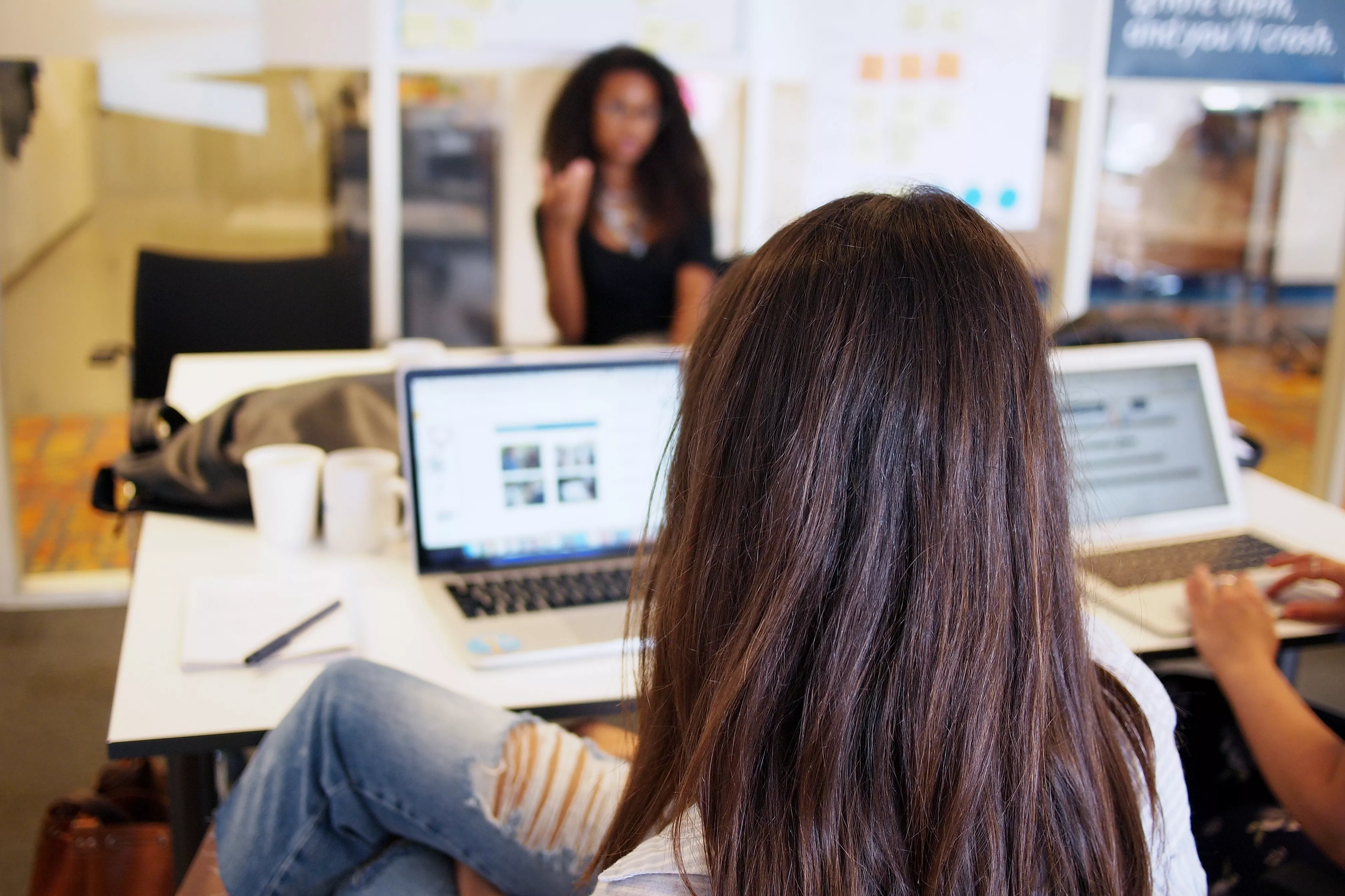 Girls with computers in class